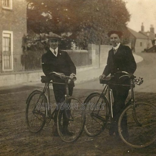 Two Dapper Cyclists Near Unknown Bridge, c. 1920s
