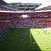 Fans congregating in the stadium for the Challenge Cup Final, Wembley, 2007